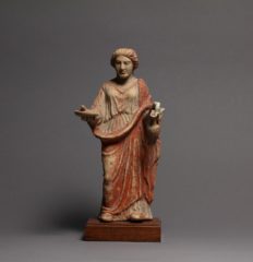 greek terracotta figure of a woman
